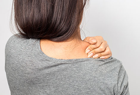 Patient suffering with shoulder and upper back pain following an auto accident